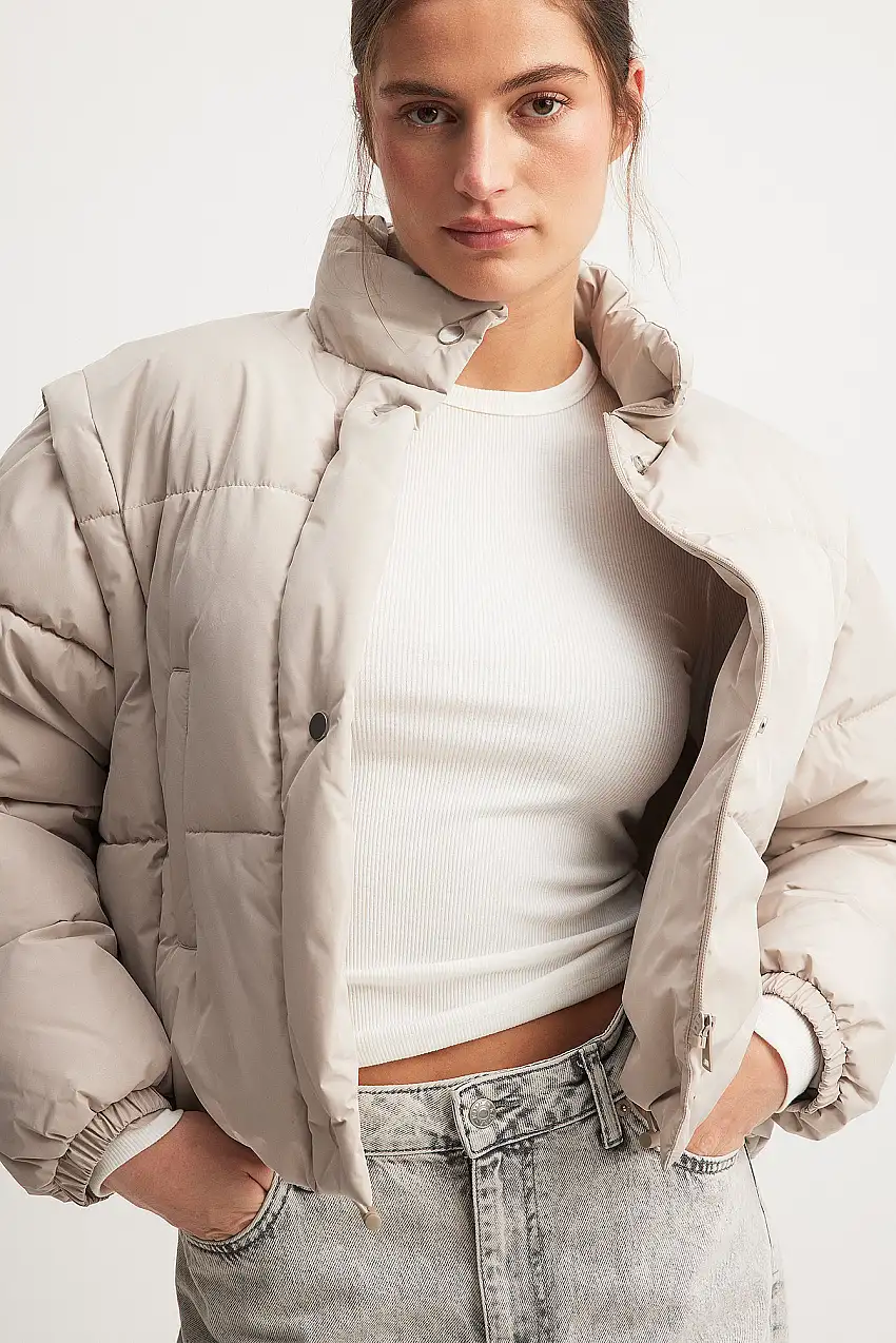 Fodrad jacka med avtagbar ärm Beige